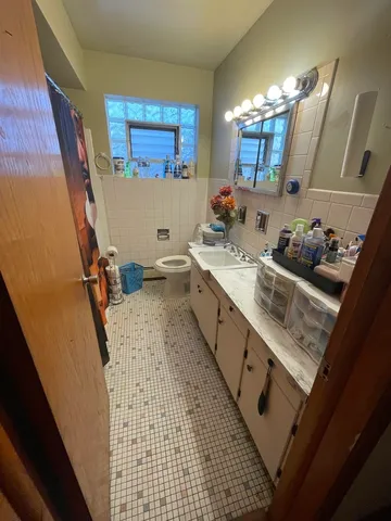 a room with gym equipment and a mirror