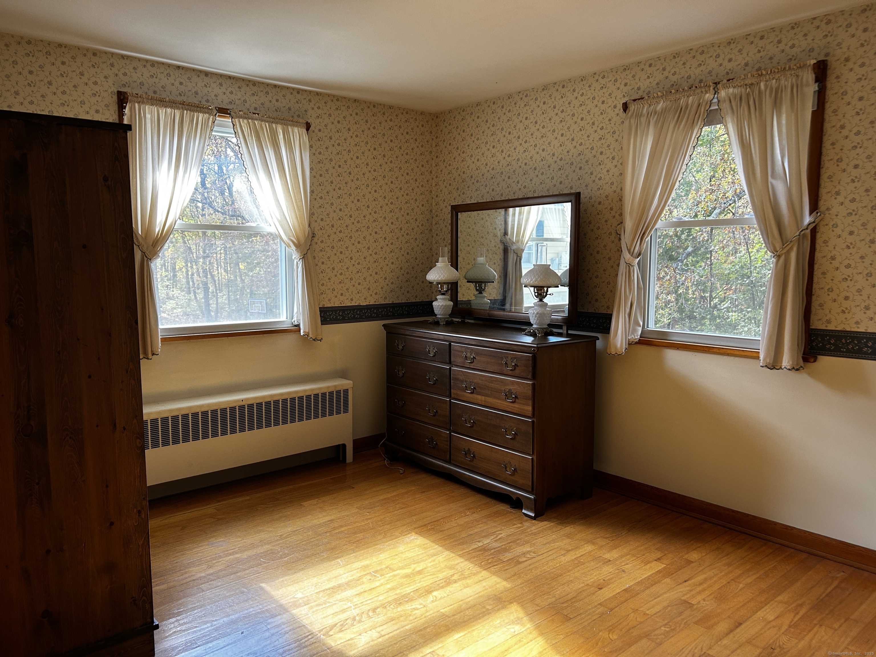 69 Wauregan Road Killingly, CT 06239 - Photo 19 of 23 a room with furniture and windows