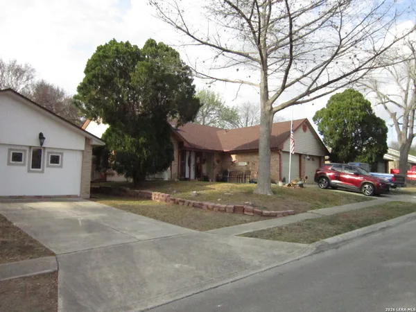 a view of outdoor space and front view of a house