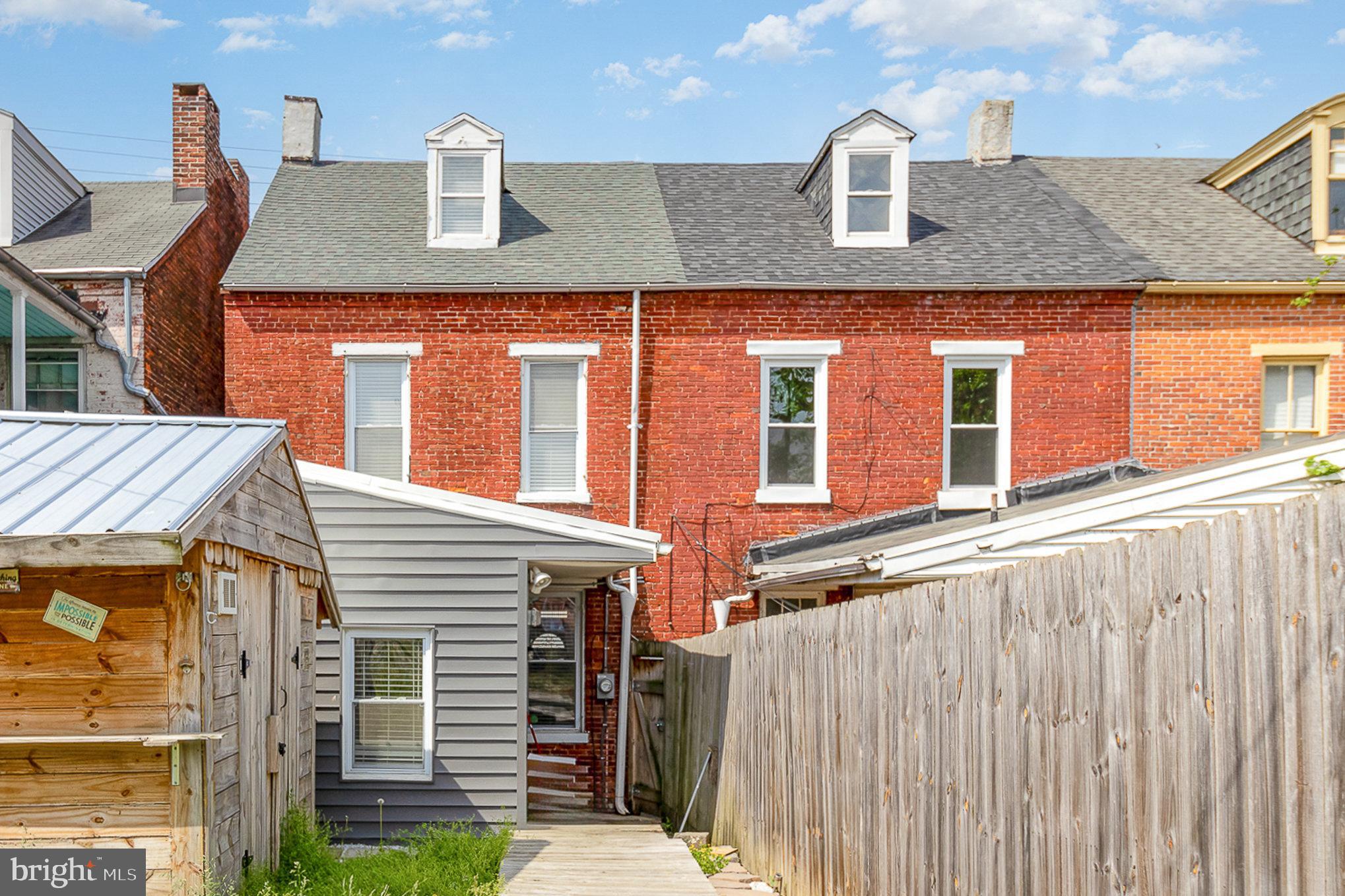 151 South Pershing Avenue York, PA 17401 - Photo 18 of 21 a front view of a house with a yard