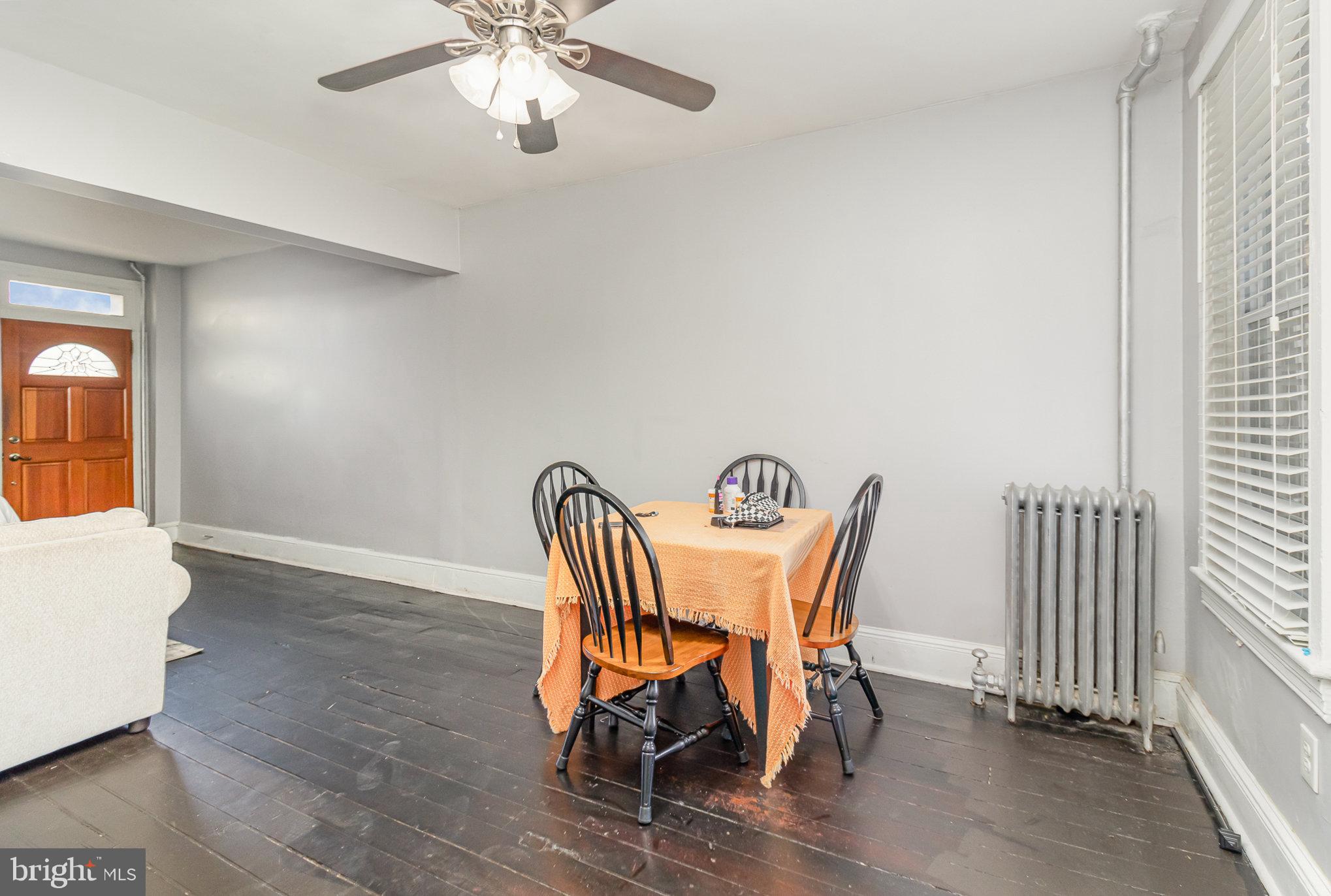 151 South Pershing Avenue York, PA 17401 - Photo 5 of 21 a view of a dining room with furniture and wooden floor