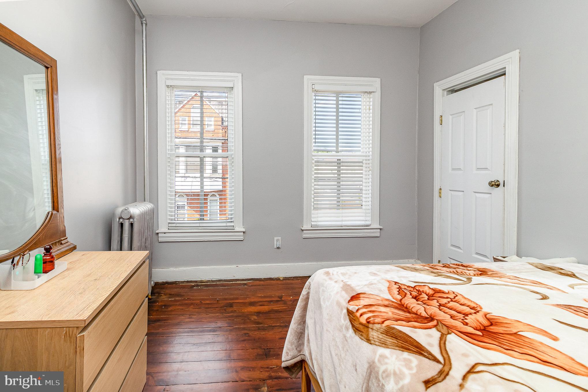 151 South Pershing Avenue York, PA 17401 - Photo 9 of 21 a bedroom with a bed and a window