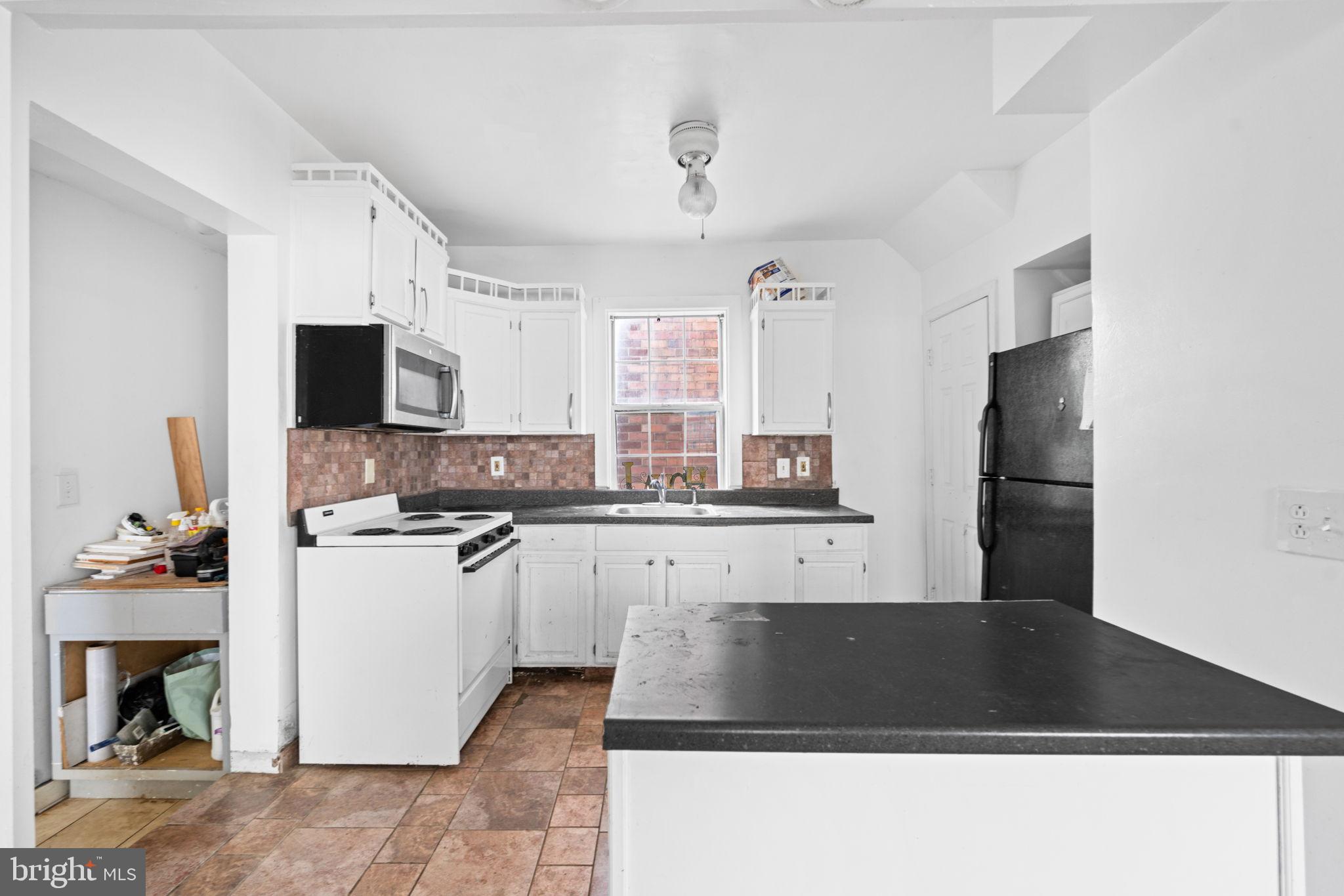 4227 Gault Place Northeast Washington, DC 20019 - Photo 12 of 34 Bright and inviting kitchen with modern touches.