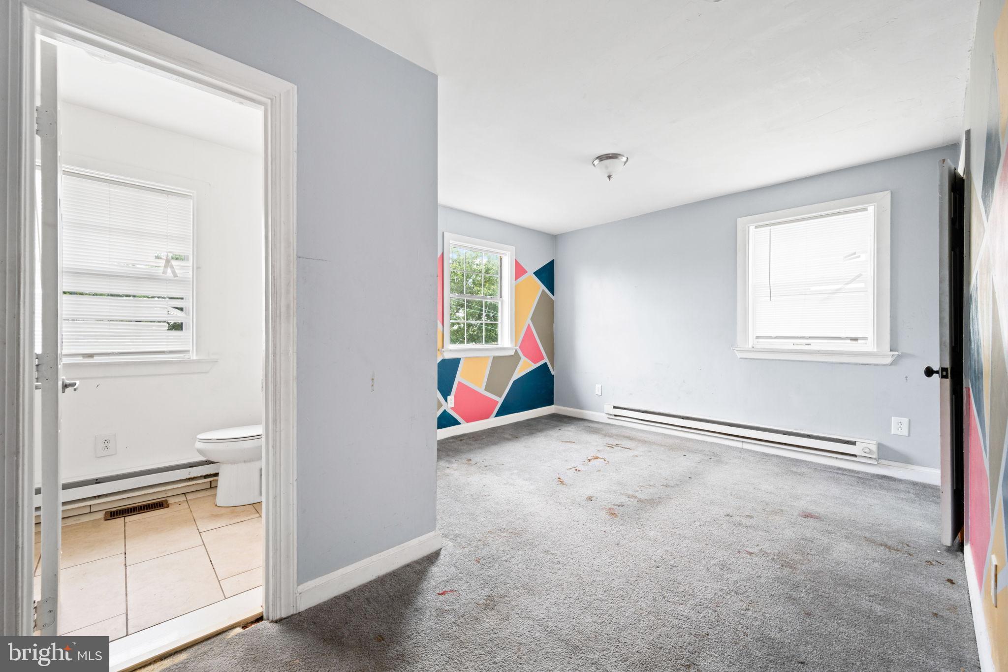 4227 Gault Place Northeast Washington, DC 20019 - Photo 21 of 34 Bright, airy space with colorful accents.