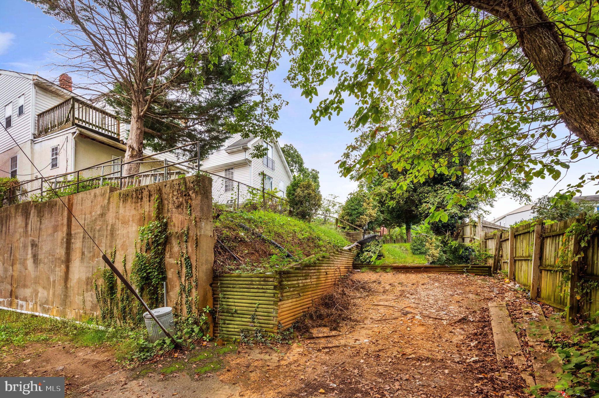4227 Gault Place Northeast Washington, DC 20019 - Photo 34 of 34 Serene backyard retreat with lush greenery.