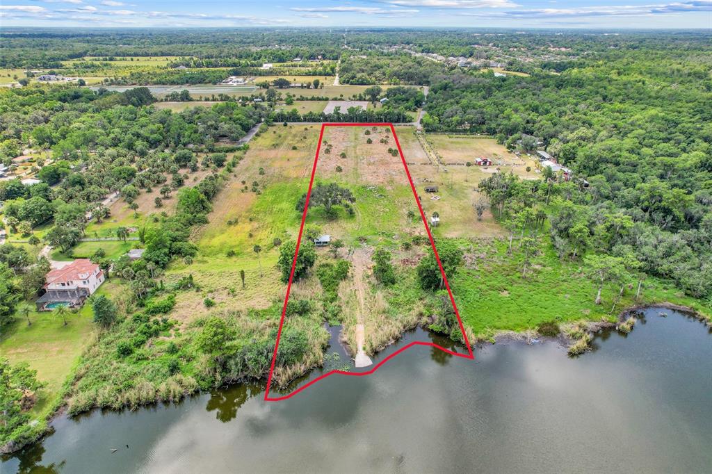 2170 Black Hammock Road Oviedo, FL 32765 - Photo 5 of 24 a view of a garden with an outdoor space