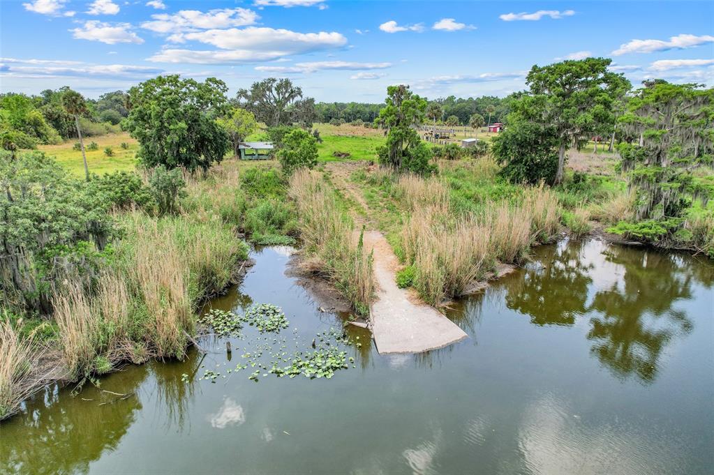 2170 Black Hammock Road Oviedo, FL 32765 - Photo 6 of 24 a view of a lake with houses in back
