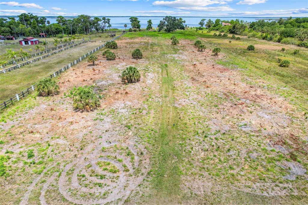 2170 Black Hammock Road Oviedo, FL 32765 - Photo 10 of 24 a view of a lake with beach and city view