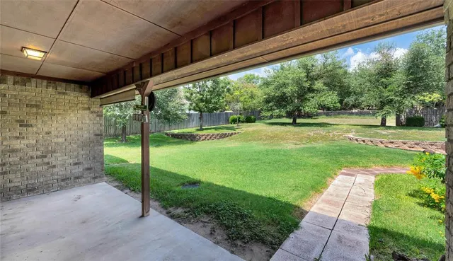 a view of a porch with a backyard