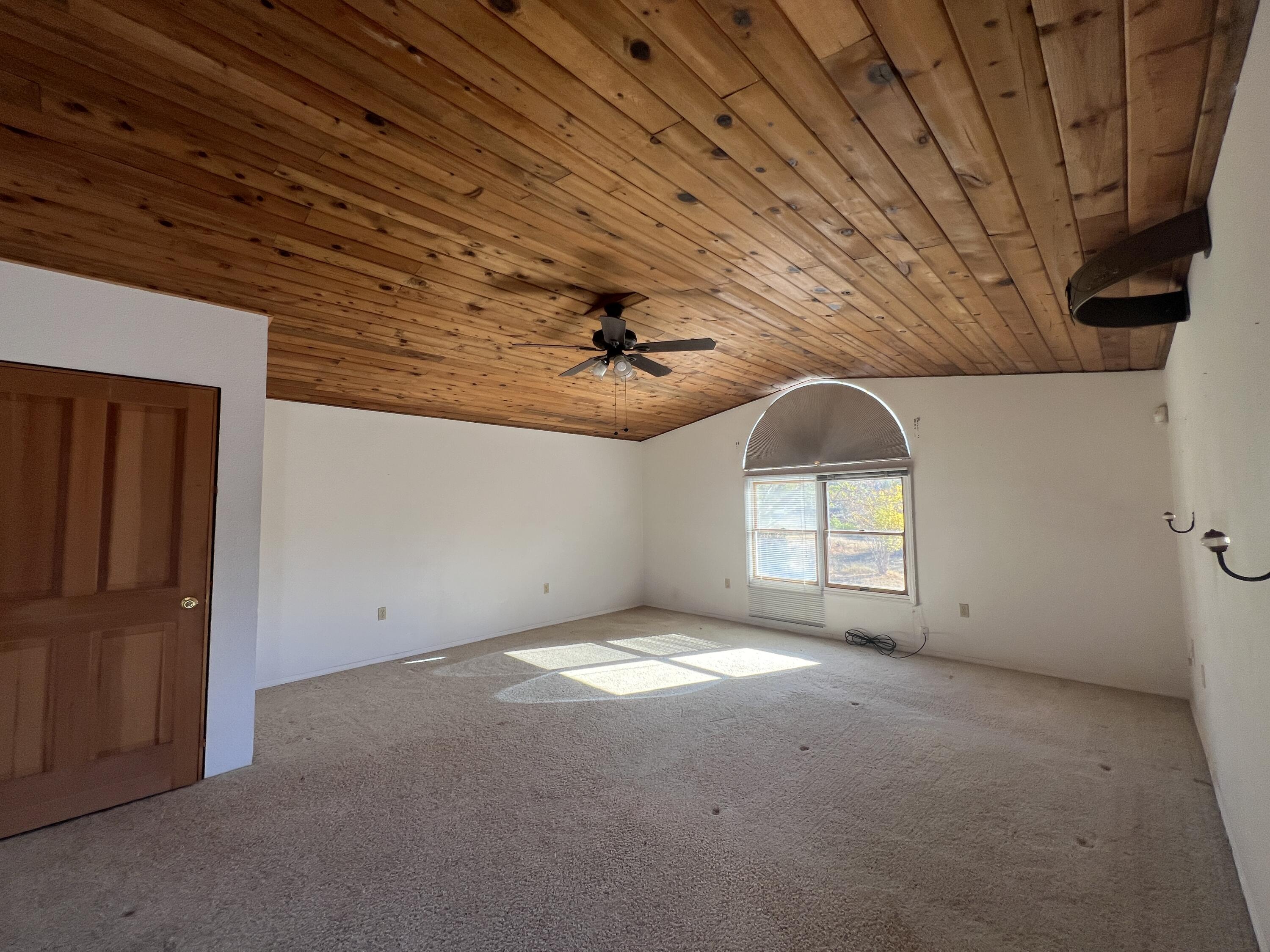7582 Black Butte Road Shingletown, CA 96088 - Photo 13 of 25 a view of a livingroom with a chandelier