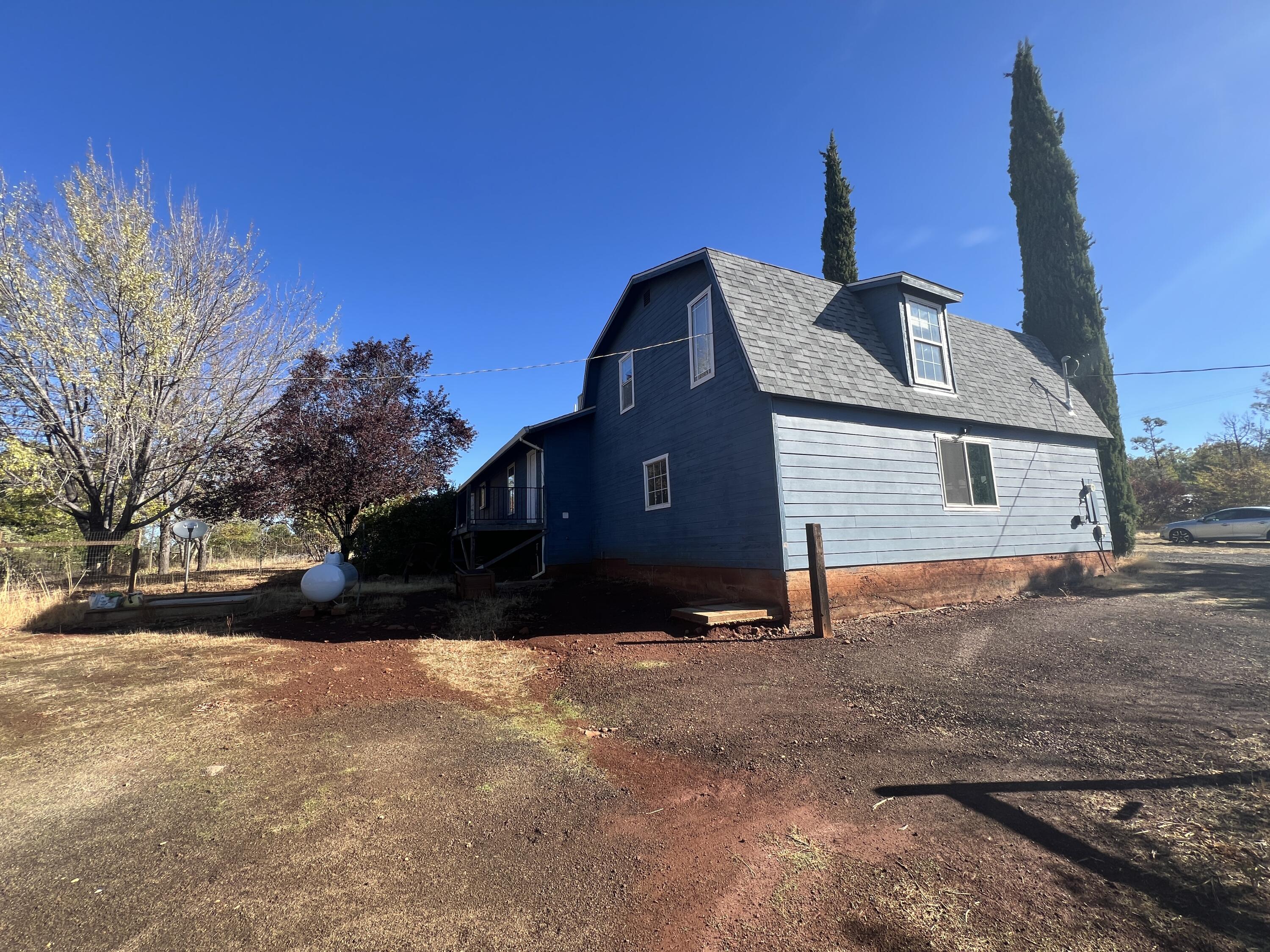 7582 Black Butte Road Shingletown, CA 96088 - Photo 18 of 25 a front view of a house with a yard