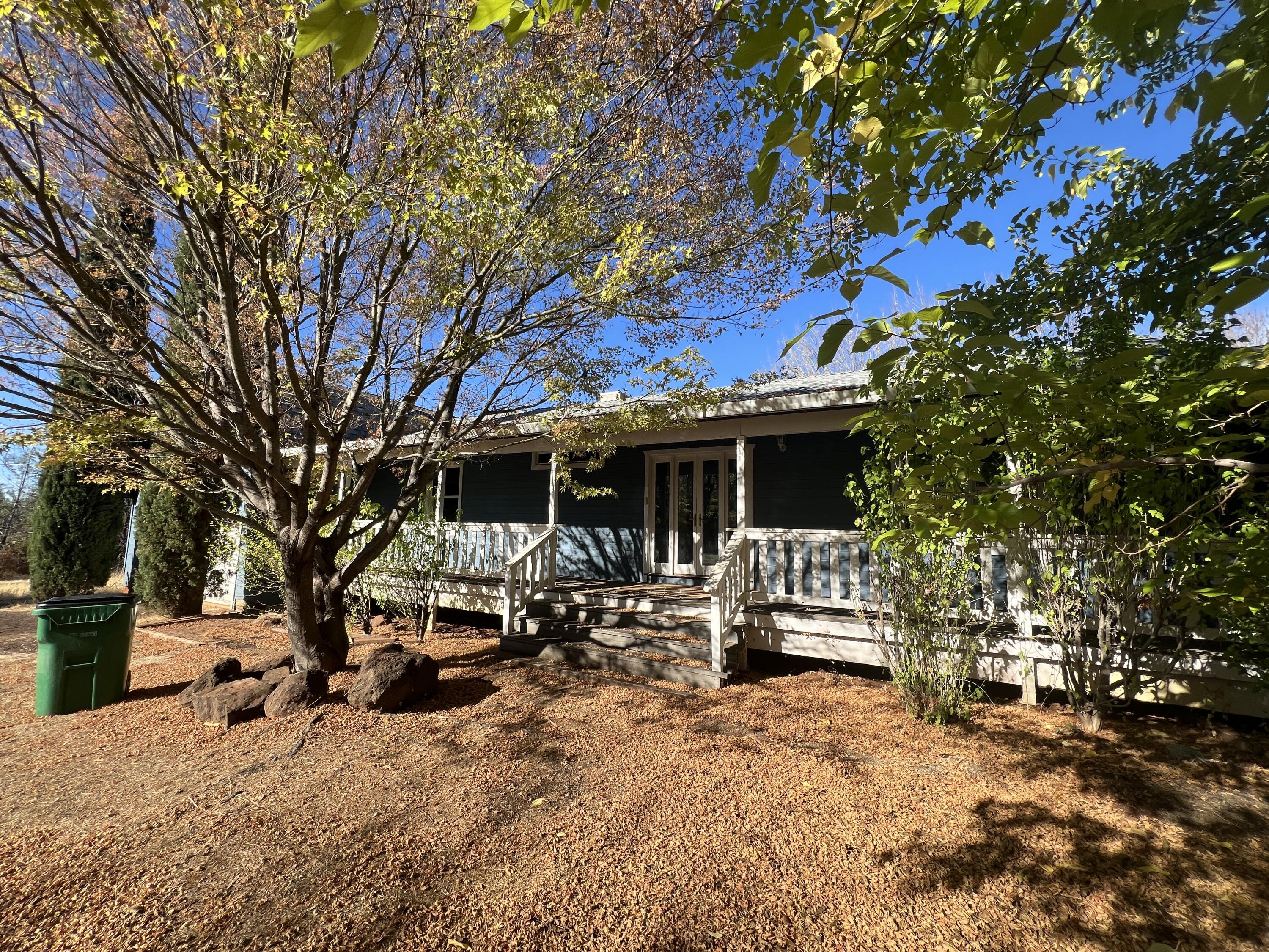 7582 Black Butte Road Shingletown, CA 96088 - Photo 2 of 25 a view of a house with a yard