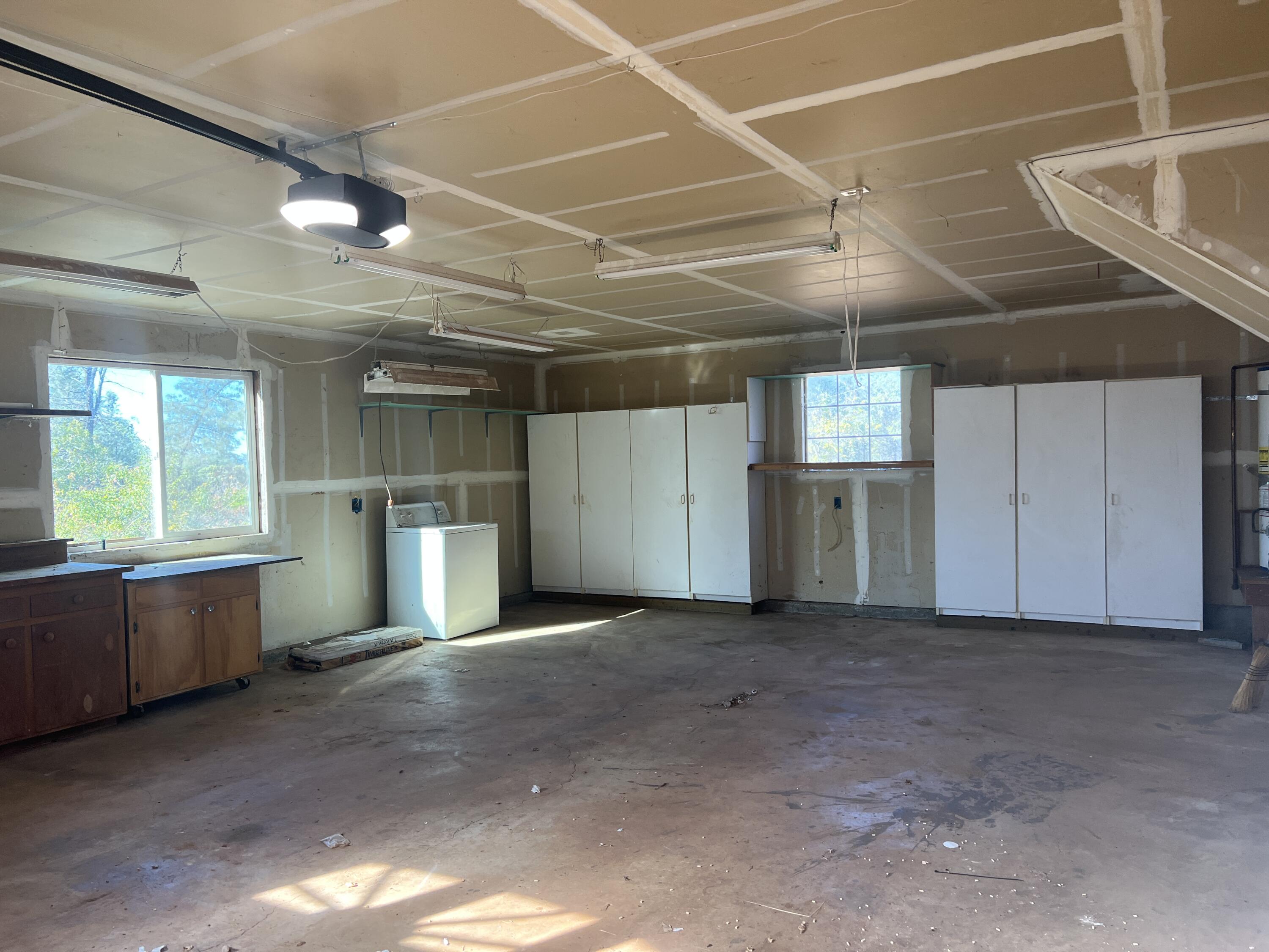 7582 Black Butte Road Shingletown, CA 96088 - Photo 21 of 25 a view of empty room with windows