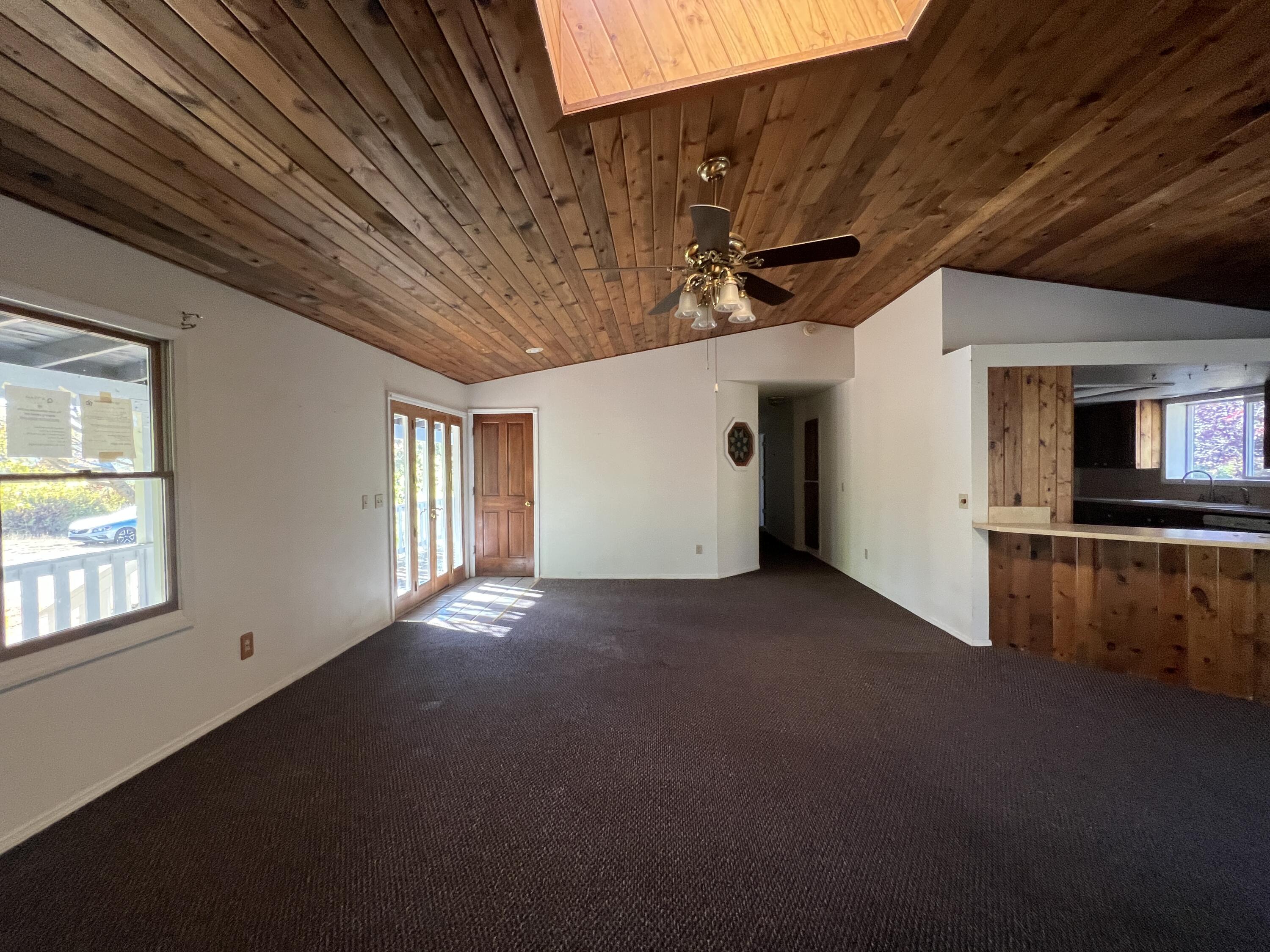 7582 Black Butte Road Shingletown, CA 96088 - Photo 6 of 25 a view of a livingroom with an empty space and a window
