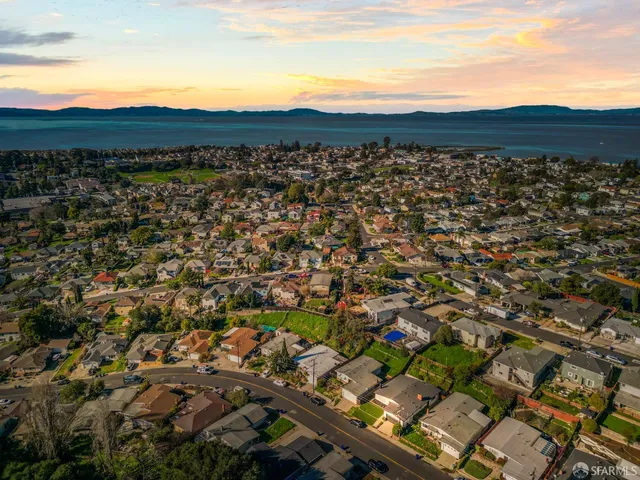 a view of a city with an ocean