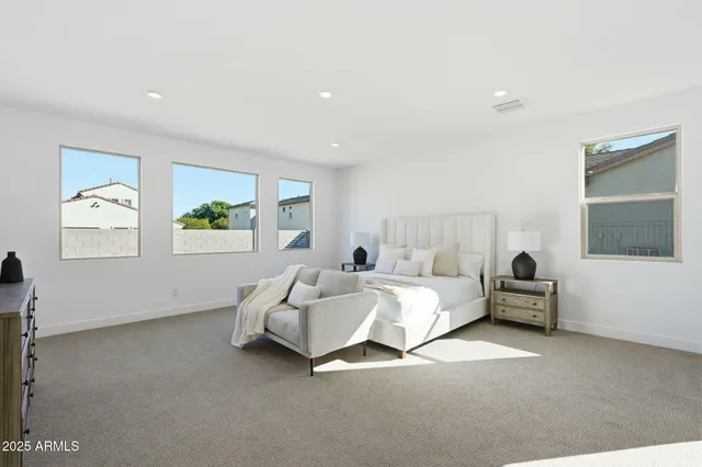 a bed room with a bed and a couch