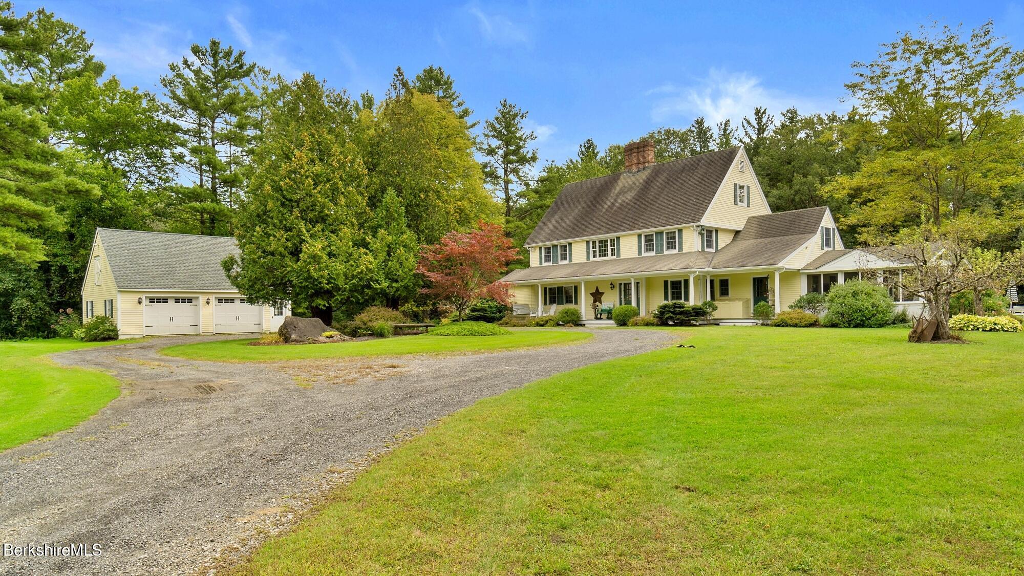 3 West Dale Road Stockbridge, MA 01229 - Photo 1 of 42 a front view of a house with a big yard