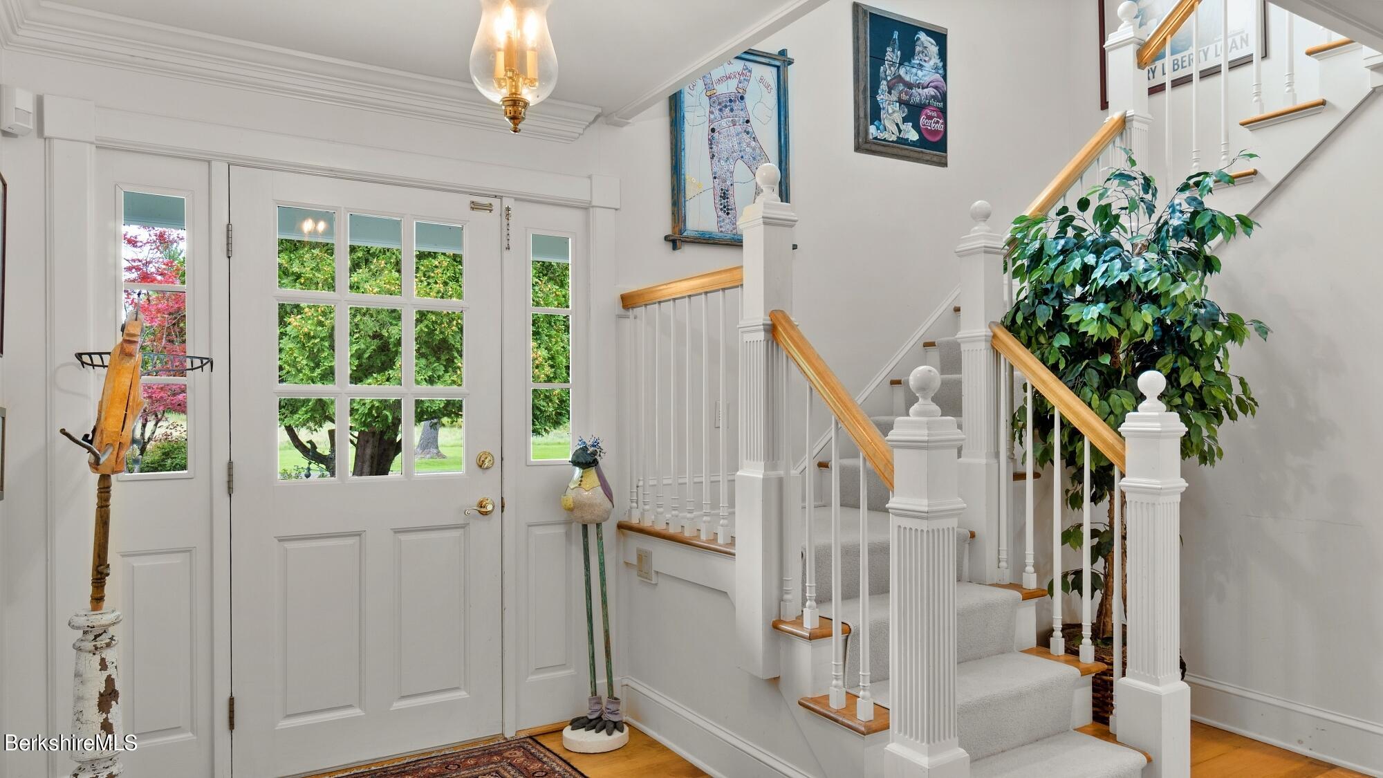 3 West Dale Road Stockbridge, MA 01229 - Photo 23 of 42 a view of an entryway with wooden floor and windows