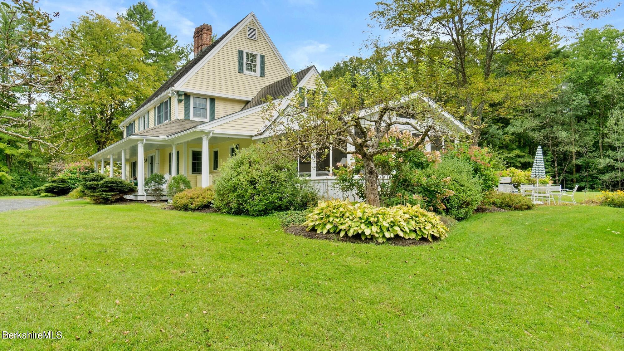 3 West Dale Road Stockbridge, MA 01229 - Photo 3 of 42 a front view of a house with garden