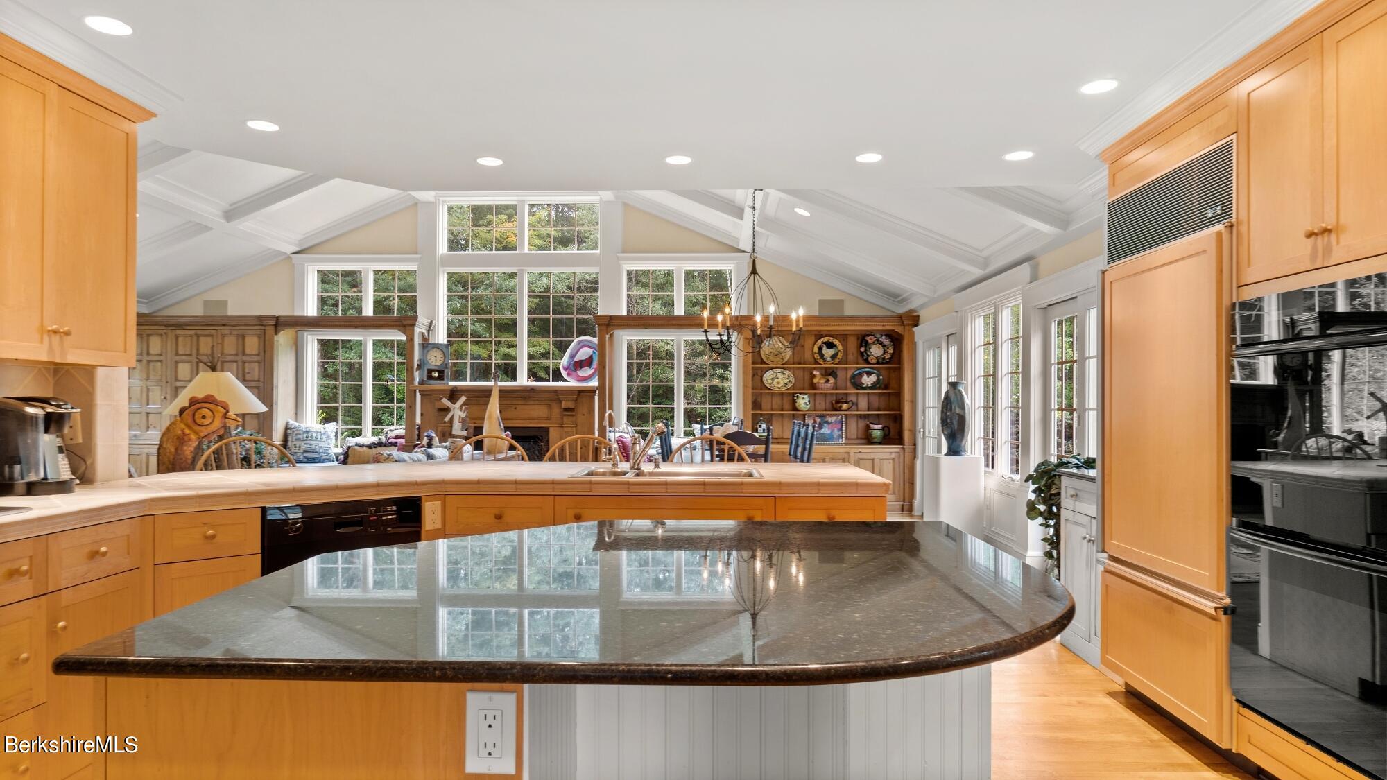 3 West Dale Road Stockbridge, MA 01229 - Photo 6 of 42 a view of a kitchen with kitchen island a large window cabinets and stainless steel appliances