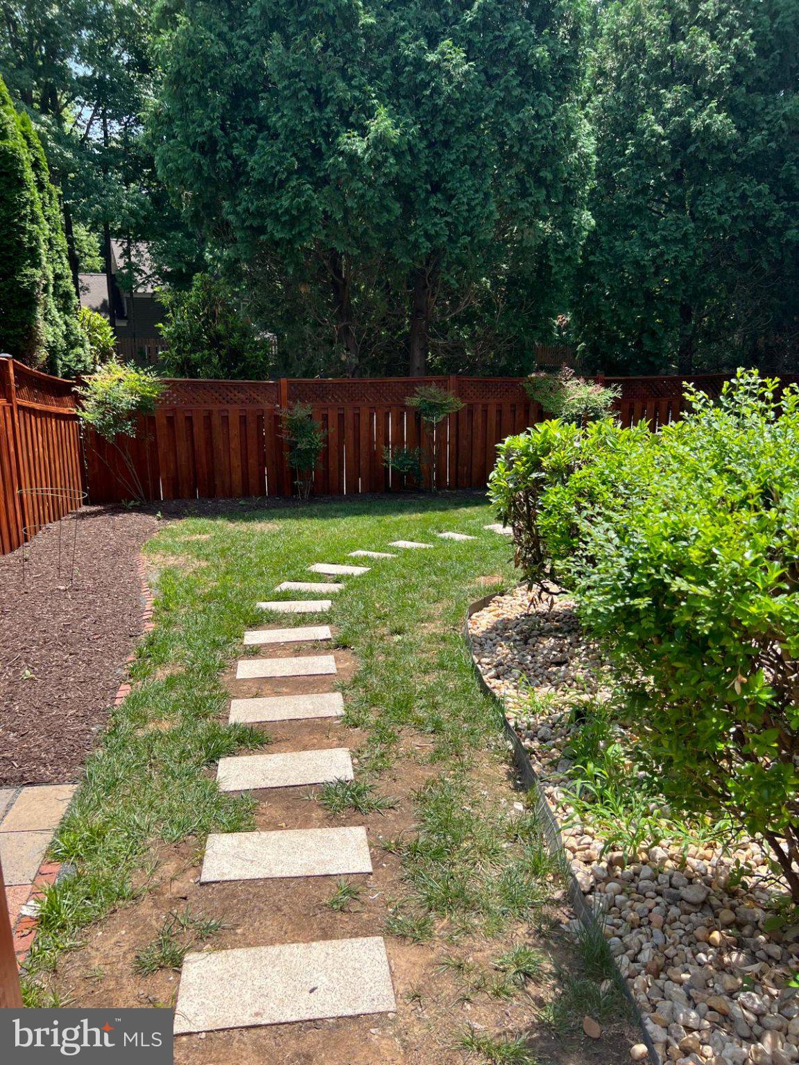 9201 Beachway Lane Springfield, VA 22153 - Photo 6 of 12 Charming garden path invites strolls.
