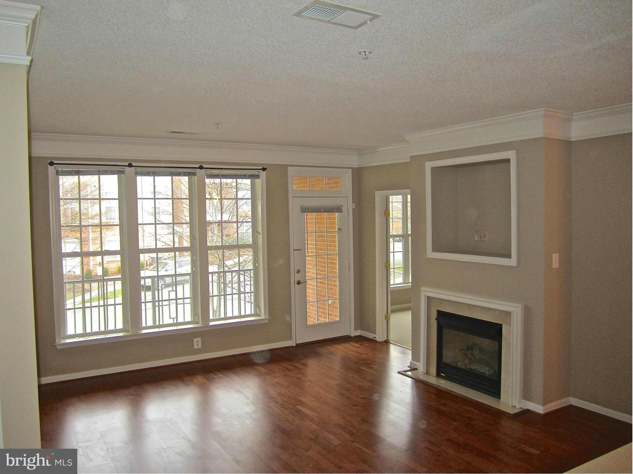 12185 Abington Hall Place, Unit 204 Reston, VA 20190 - Photo 2 of 26 Kitchen over looking Living Room