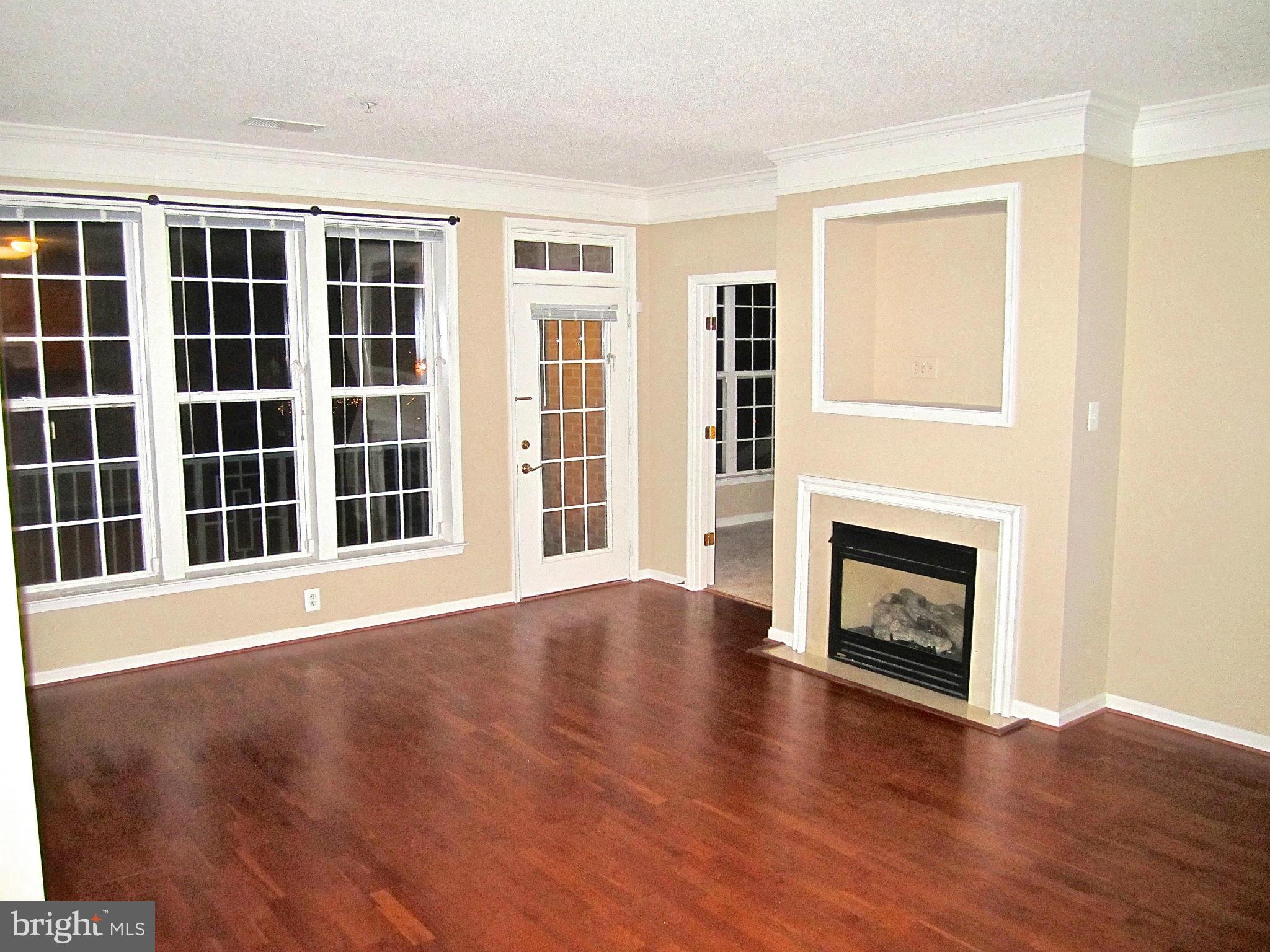 12185 Abington Hall Place, Unit 204 Reston, VA 20190 - Photo 24 of 26 Living Room