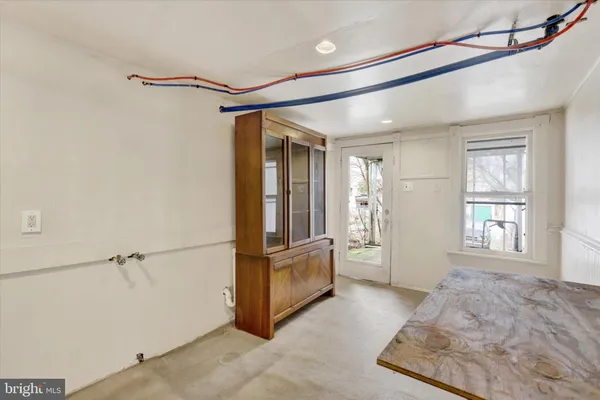 a bathroom with a mirror and a shower