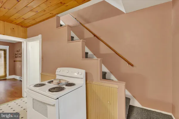 a view of storage and utility room with washer and dryer