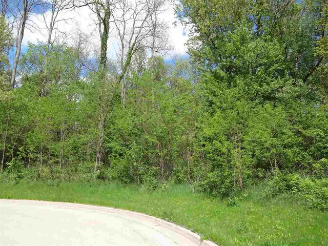 a picture of a bathroom with a shower curtain
