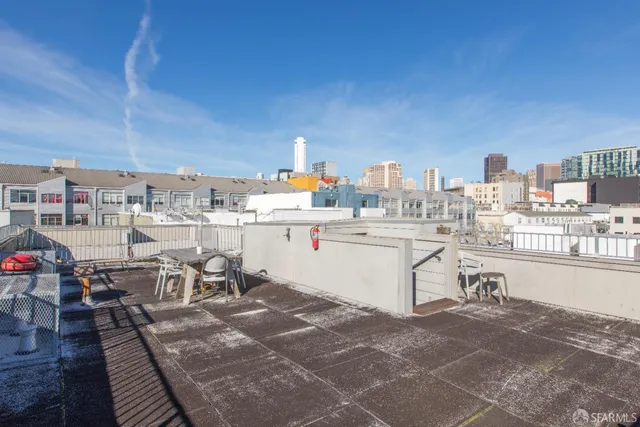a view of a terrace with sitting area