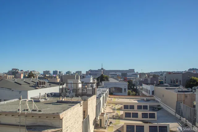 a view of street with sitting area
