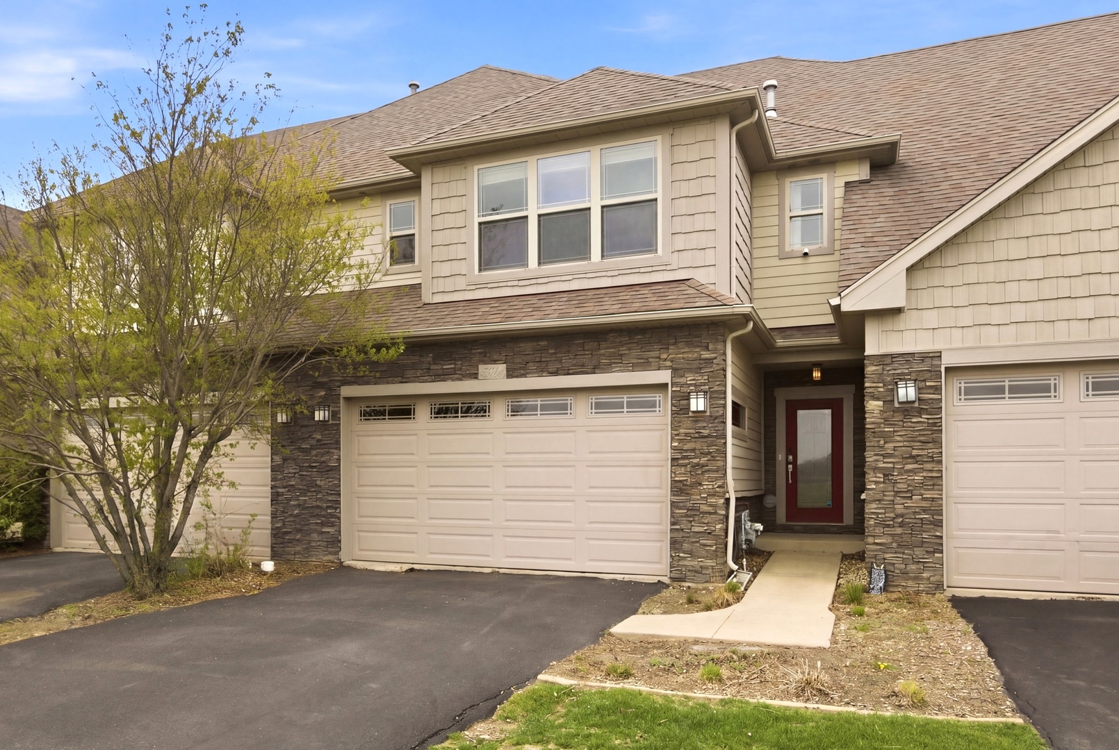15749 West Crobally Way Manhattan, IL 60442 - Photo 1 of 24 a front view of a house with garden
