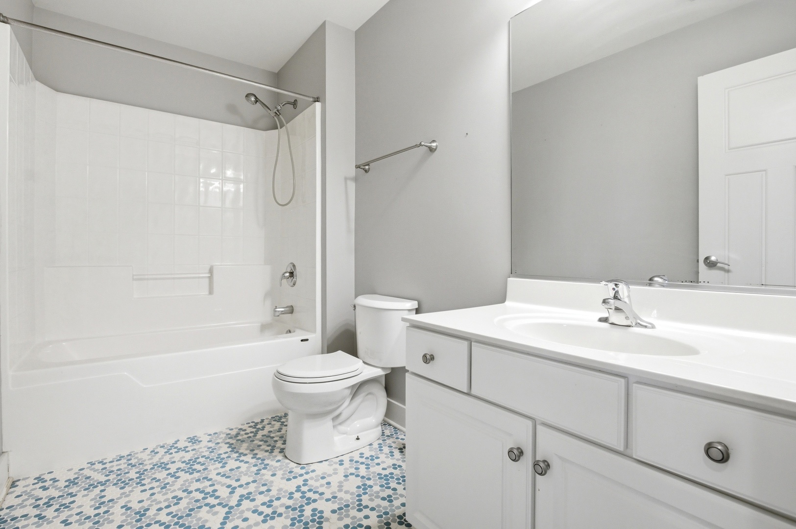 15749 West Crobally Way Manhattan, IL 60442 - Photo 18 of 24 a bathroom with a sink toilet vanity and shower