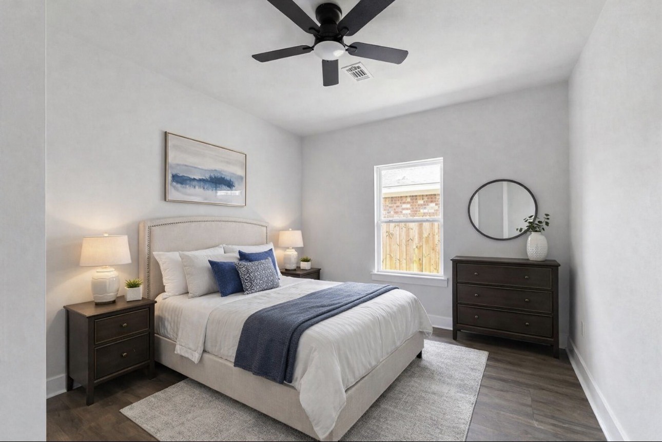 6010 Bobby Burns Street Houston, TX 77028 - Photo 17 of 22 a bedroom with a bed and window