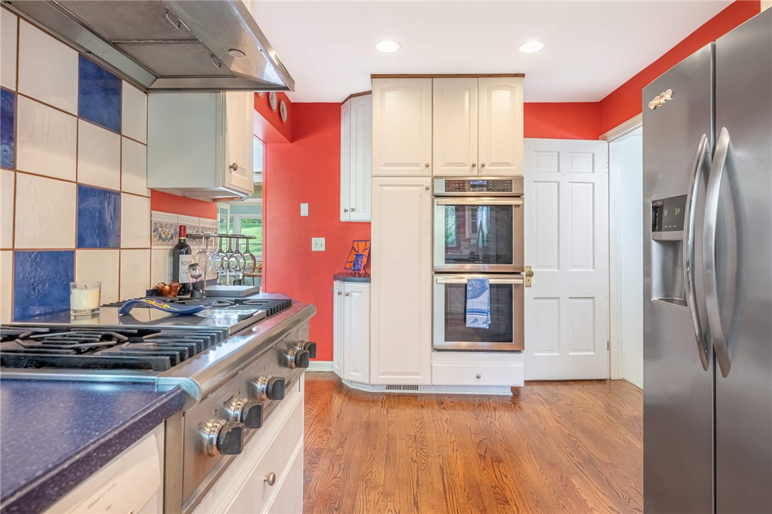 156 West Hadley Road Dayton, OH 45419 - Photo 13 of 71 This spacious kitchen offers ample space for culinary exploration and delightful entertaining.