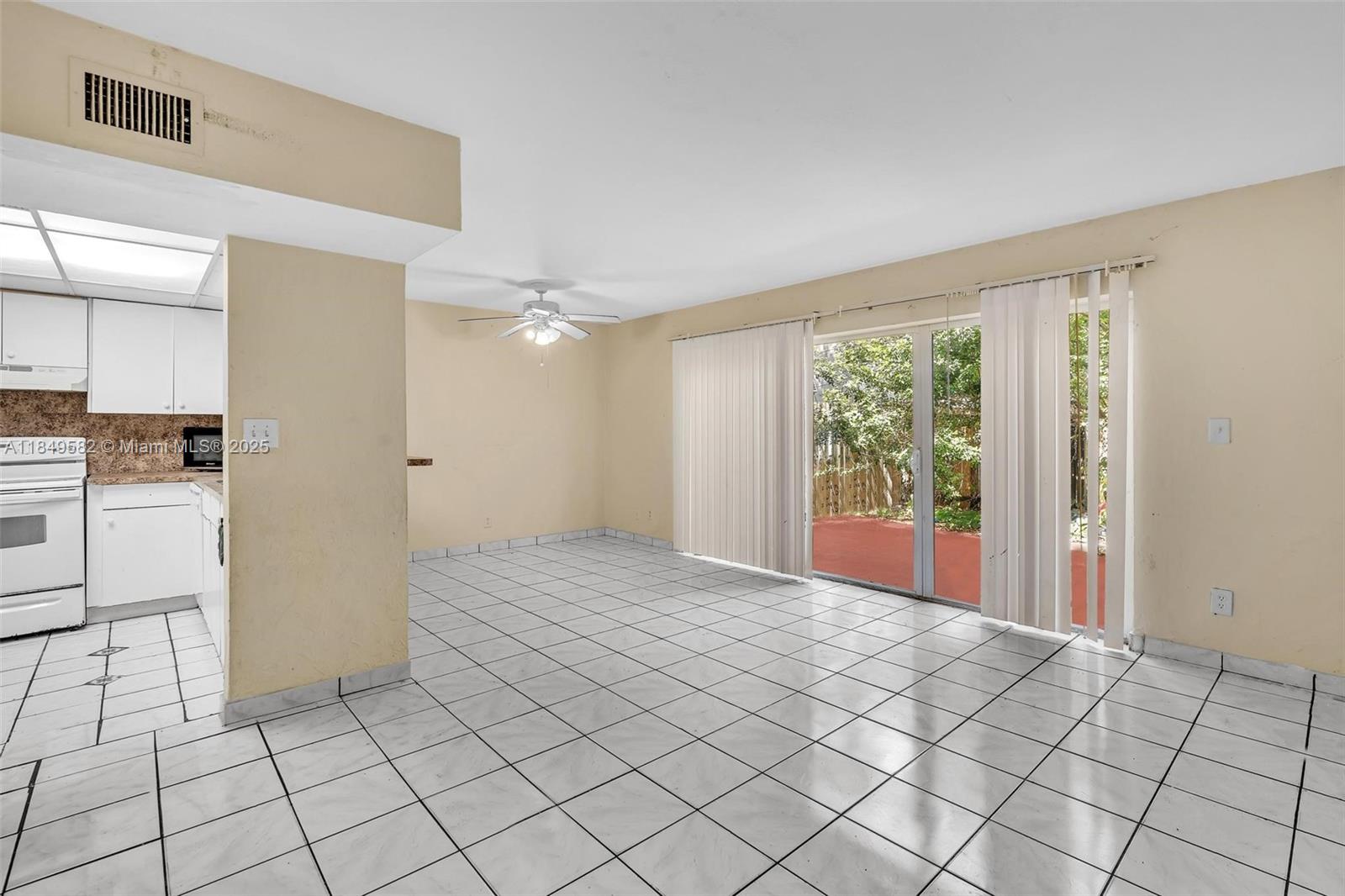 3750 Southwest 60th Terrace, Unit 1 Davie, FL 33314 - Photo 12 of 56 a view of an empty room and window