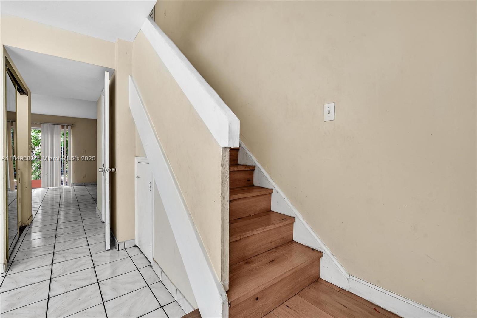 3750 Southwest 60th Terrace, Unit 1 Davie, FL 33314 - Photo 28 of 56 a view of entryway and hall with wooden floor