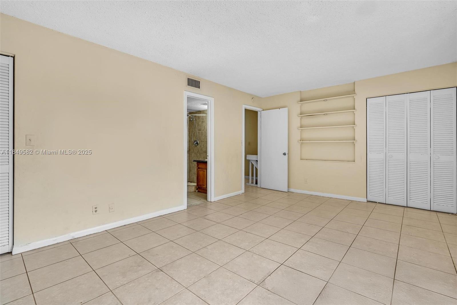 3750 Southwest 60th Terrace, Unit 1 Davie, FL 33314 - Photo 33 of 56 an empty room with closet
