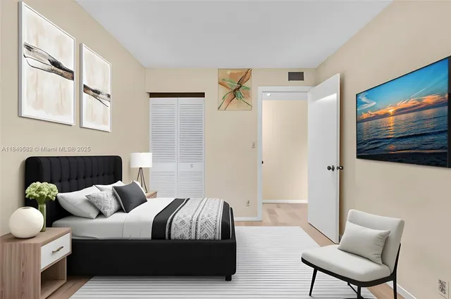 a bedroom with a bed and book shelf