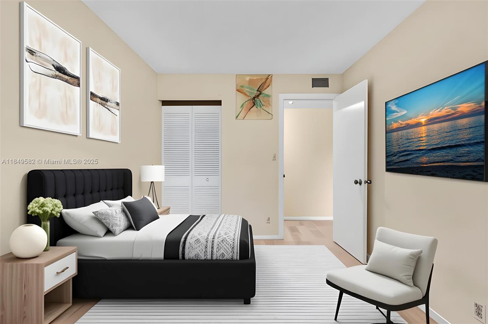 3750 Southwest 60th Terrace, Unit 1 Davie, FL 33314 - Photo 37 of 56 a living room with furniture and a flat screen tv