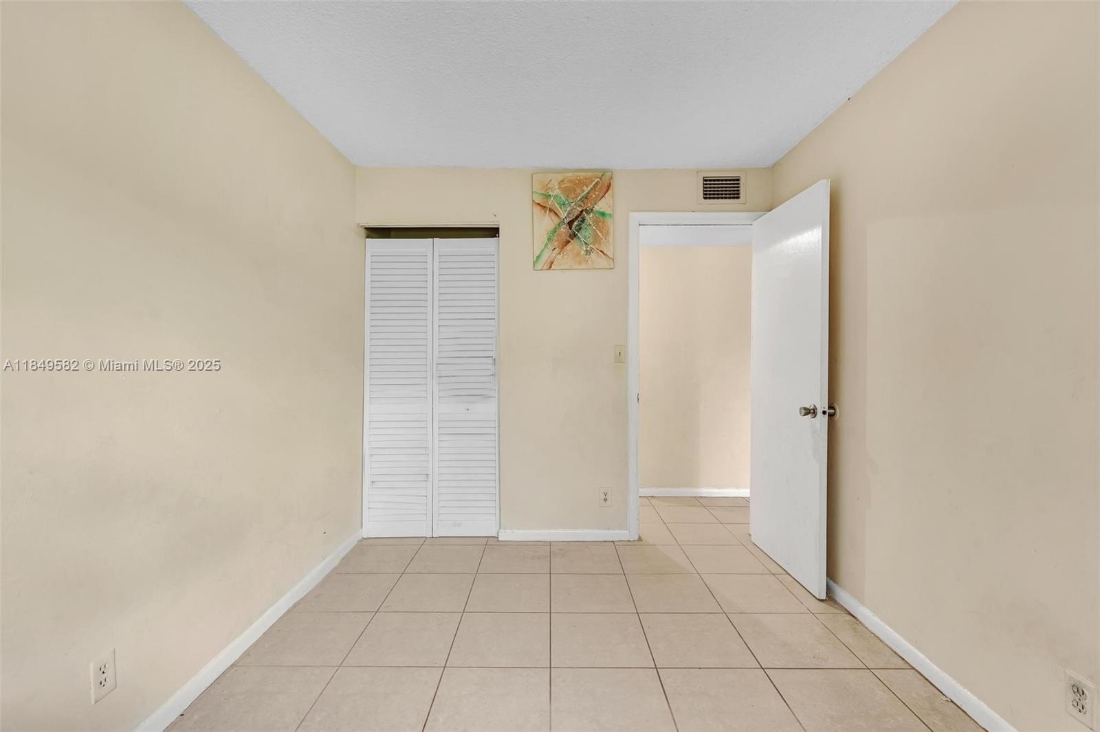 3750 Southwest 60th Terrace, Unit 1 Davie, FL 33314 - Photo 38 of 56 a view of an empty room