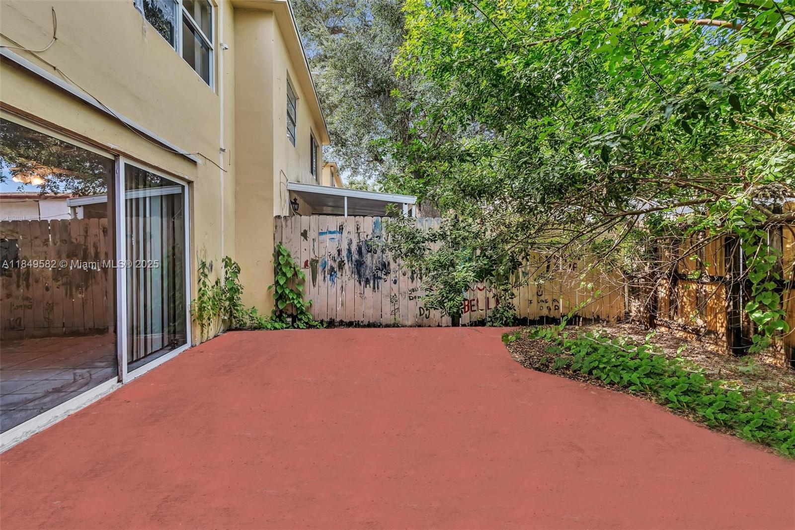 3750 Southwest 60th Terrace, Unit 1 Davie, FL 33314 - Photo 47 of 56 a view of a backyard of the house