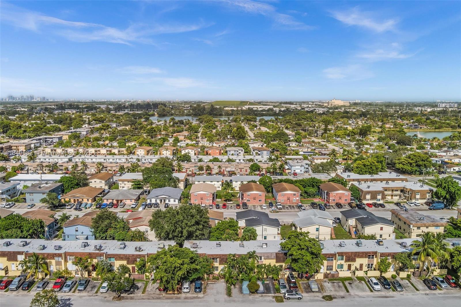 3750 Southwest 60th Terrace, Unit 1 Davie, FL 33314 - Photo 54 of 56 an aerial view of residential building with green space