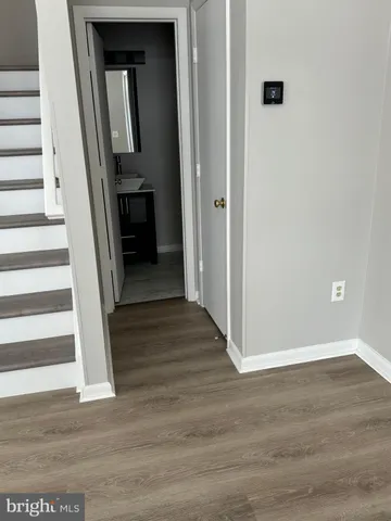 a view of front door and bedroom