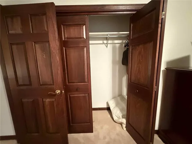 a large bathroom with a large tub and sink