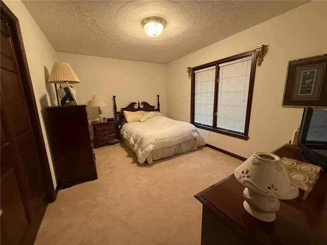 a bathroom with a toilet and a sink