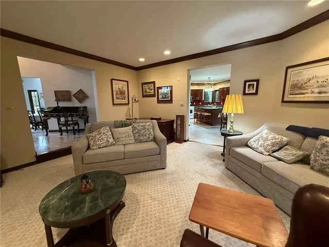 a living room with furniture and a couch