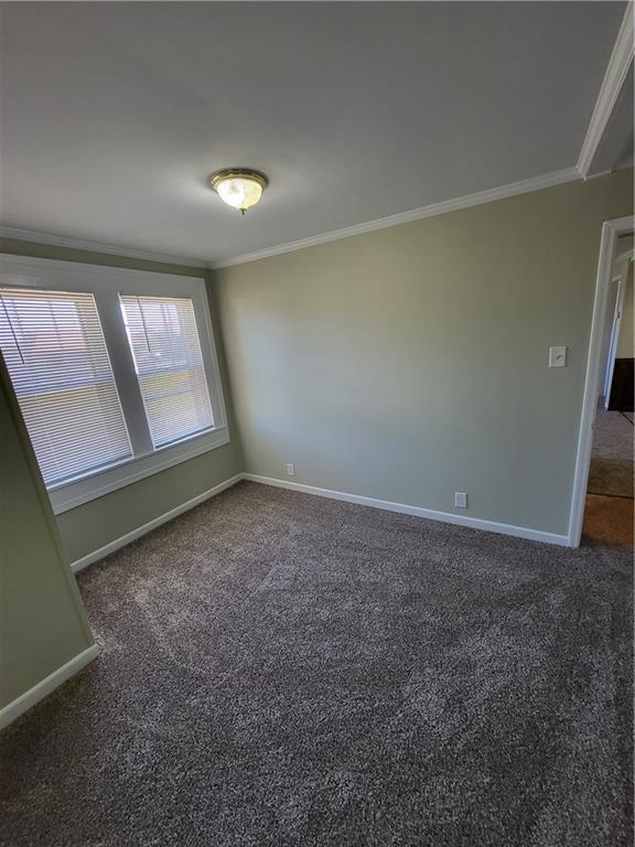 3059 Maysville Road Commerce, GA 30529 - Photo 6 of 9 an empty room with windows