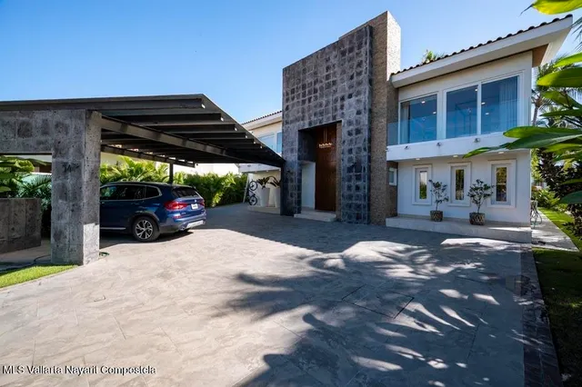 a view of a car garage of a house